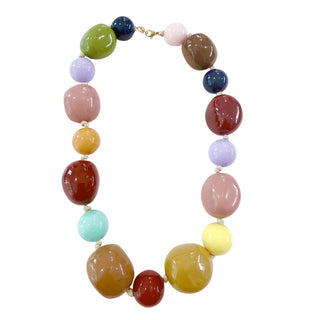 Chunky statement necklace with multi-shaped colorful beads and gold-plated accents.