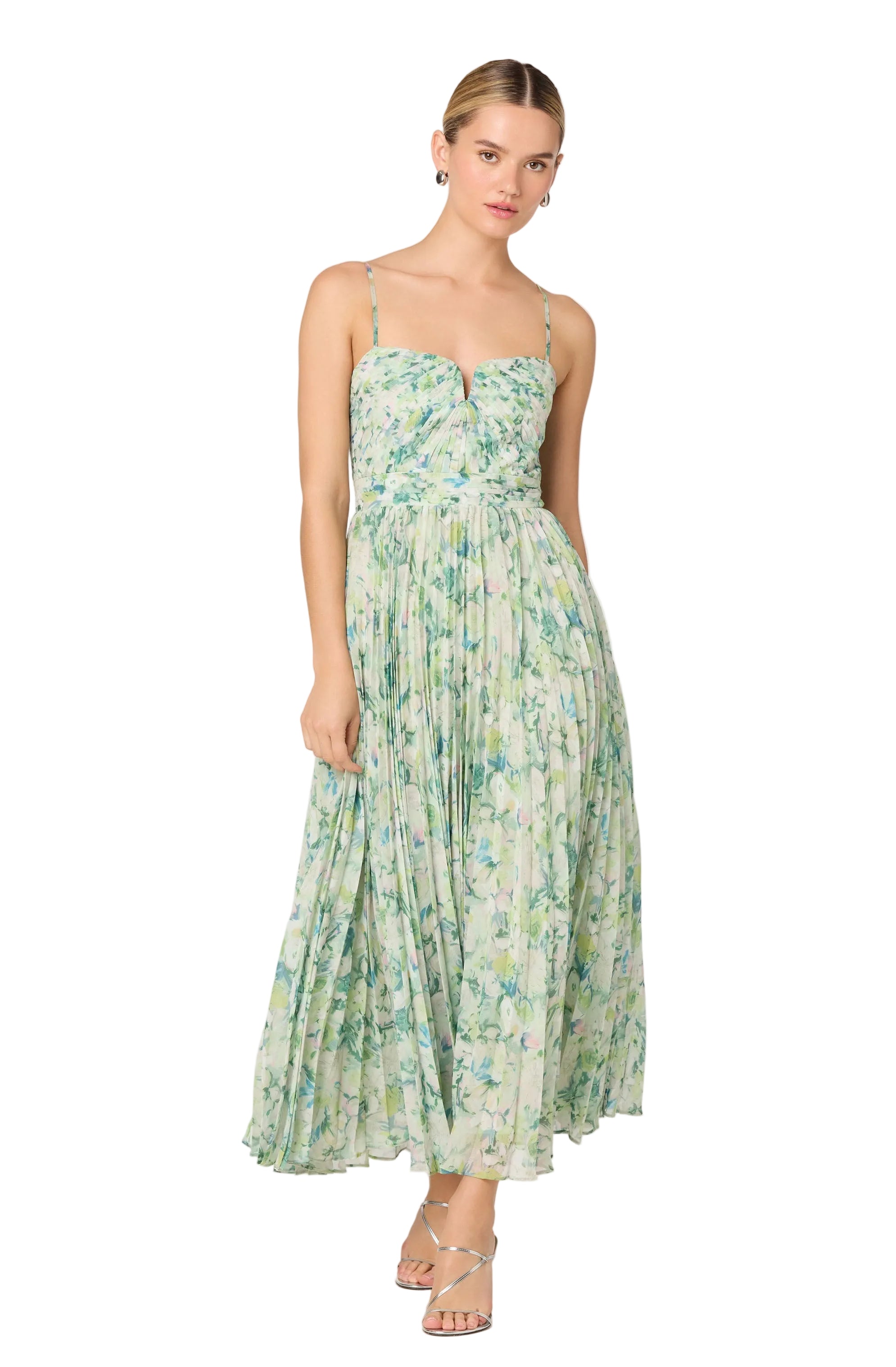 Woman wearing a floral dress on a white background