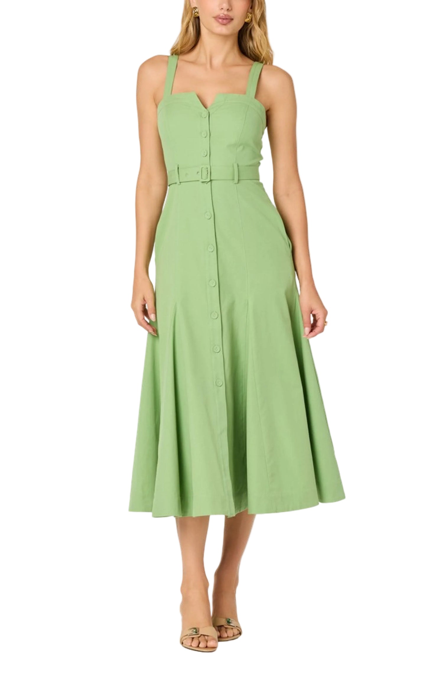 Woman wearing a green dress on a white background