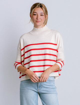 Oversized boxy sweater with sailor stripe pattern, ribbed crew neckline, and 3/4 sleeves.