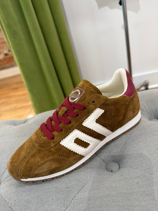 Back 70 Asian sneaker in tobacco brown suede with deep cabernet laces and white detailing on a grey surface.
